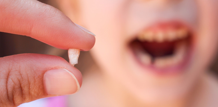Verlust des ersten Milchzahns früheste dentale Erinnerung
