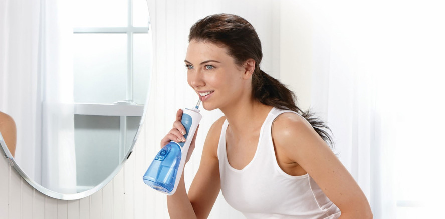 Dentaler Biofilm – mit Munddusche unter Kontrolle halten