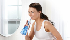 Dentaler Biofilm – mit Munddusche unter Kontrolle halten