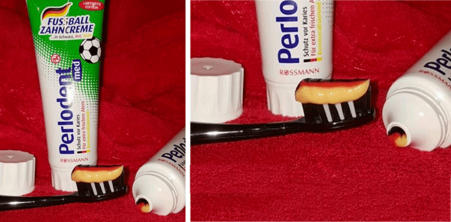 Zähneputzen mit Schwarz, Rot, Gold